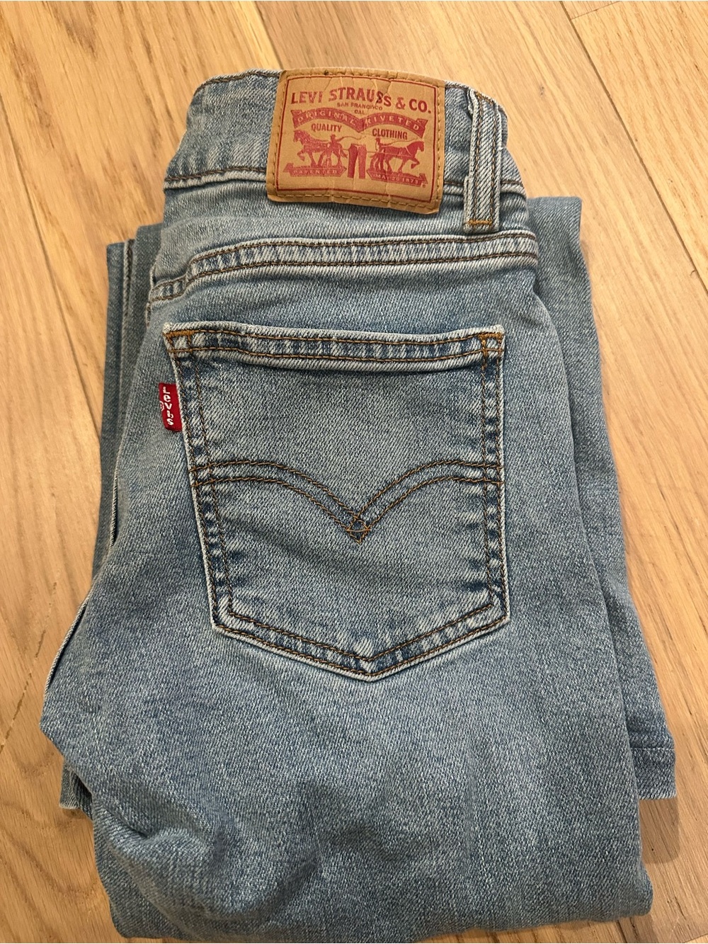 Levi's woman Light Blue super low Flare Jeans with Signature Back Pocket 23”